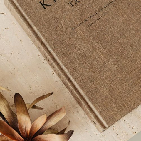 kaboompics_the-book-lies-on-a-travertine-table-kinfolk-dried-flower-27376-VSCO